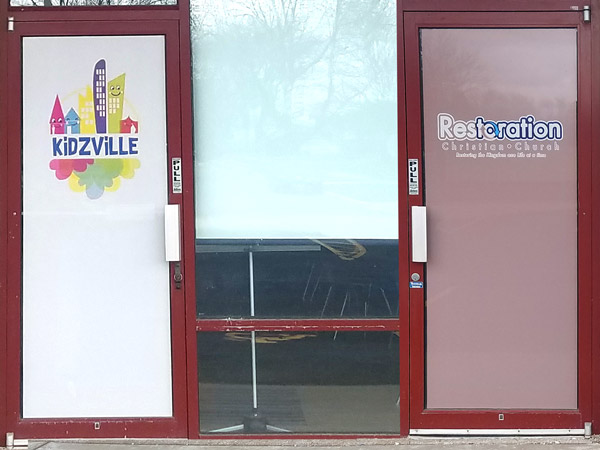 Custom door signs and door graphics for businesses in Joliet, Shorewood, and Crest Hill