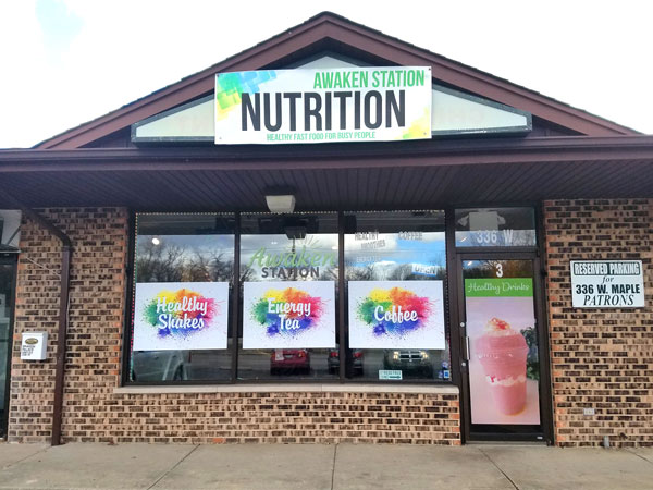 Perforated window signs installed for businesses in Joliet, New Lenox, and Shorewood